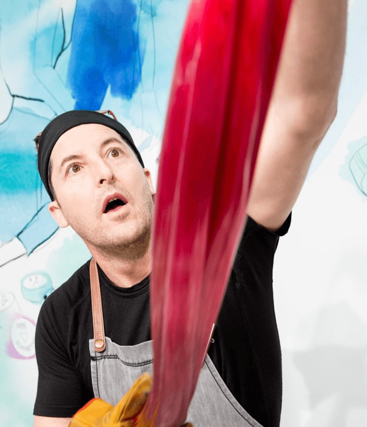 Roc Candy confectioner hand-pulling red candy